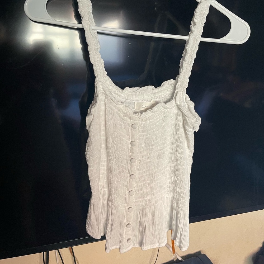 Flowy white tank